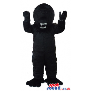 Fierceful black gorilla with sharp teeth - Custom Mascots