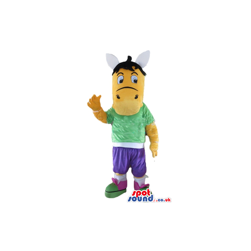 Orange horse with black hair wearing a green t-shirt, purple