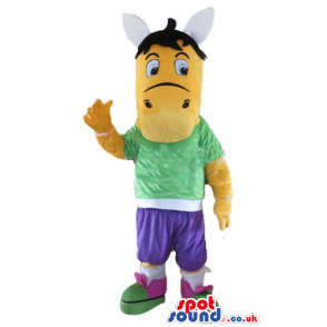 Orange horse with black hair wearing a green t-shirt, purple