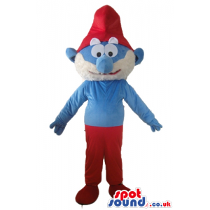 Papa smurf with a white beard, red trousers and a red hat -