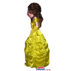 Princess with long brown hair wearing a long yellow dress -