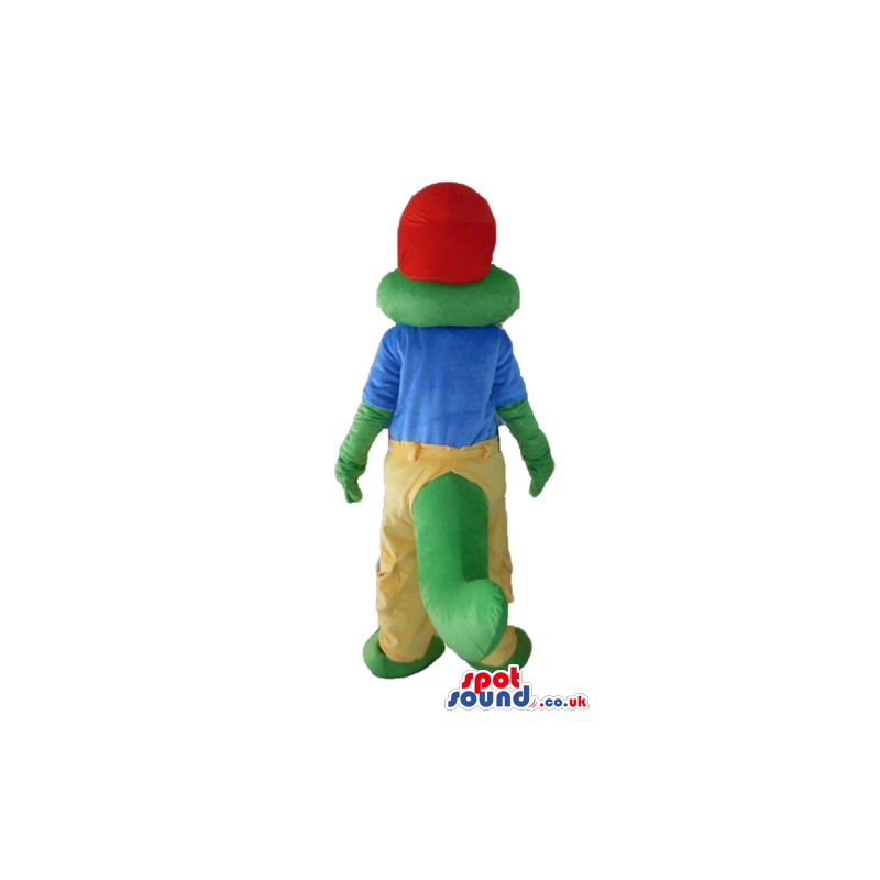 Crocodile wearing a red cap, a blue t-shirt and yellow trousers