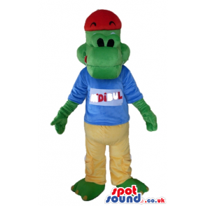 Crocodile wearing a red cap, a blue t-shirt and yellow trousers