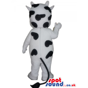 Happy white cow with a few black dots - Custom Mascots