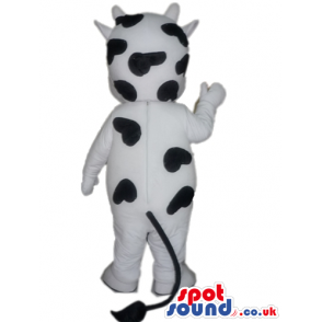 Happy white cow with a few black dots - Custom Mascots